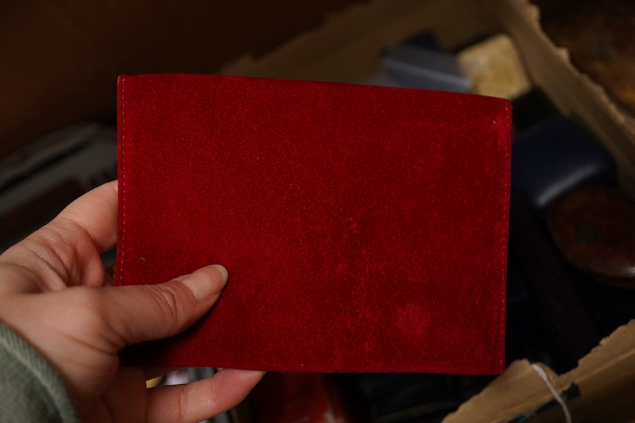 A quantity of assorted jewellery boxes including a Cartier red suede pouch. Condition - poor to fair to good.